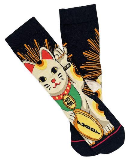 A pair of black crew socks featuring a graphic of a Japanese Maneki-neko (lucky cat) holding a gold coin, with red and orange burst lines behind it.