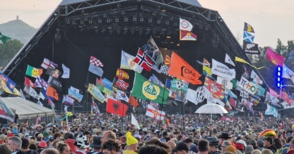 Flags obscuring every act on the pyramid stage at Glastonbury. 
