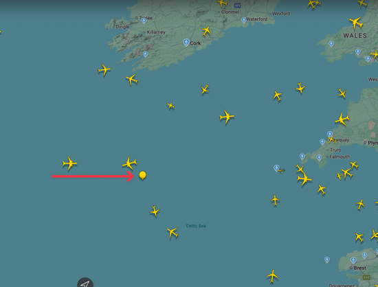 Flight Radar Aircraft tracking map showing planes over the East Atlantic with the bottom of Ireland and Parts of England, Wales and France showing. There are planes everywhere but  below Ireland and in line withthe top of Cornwall is a balloon!